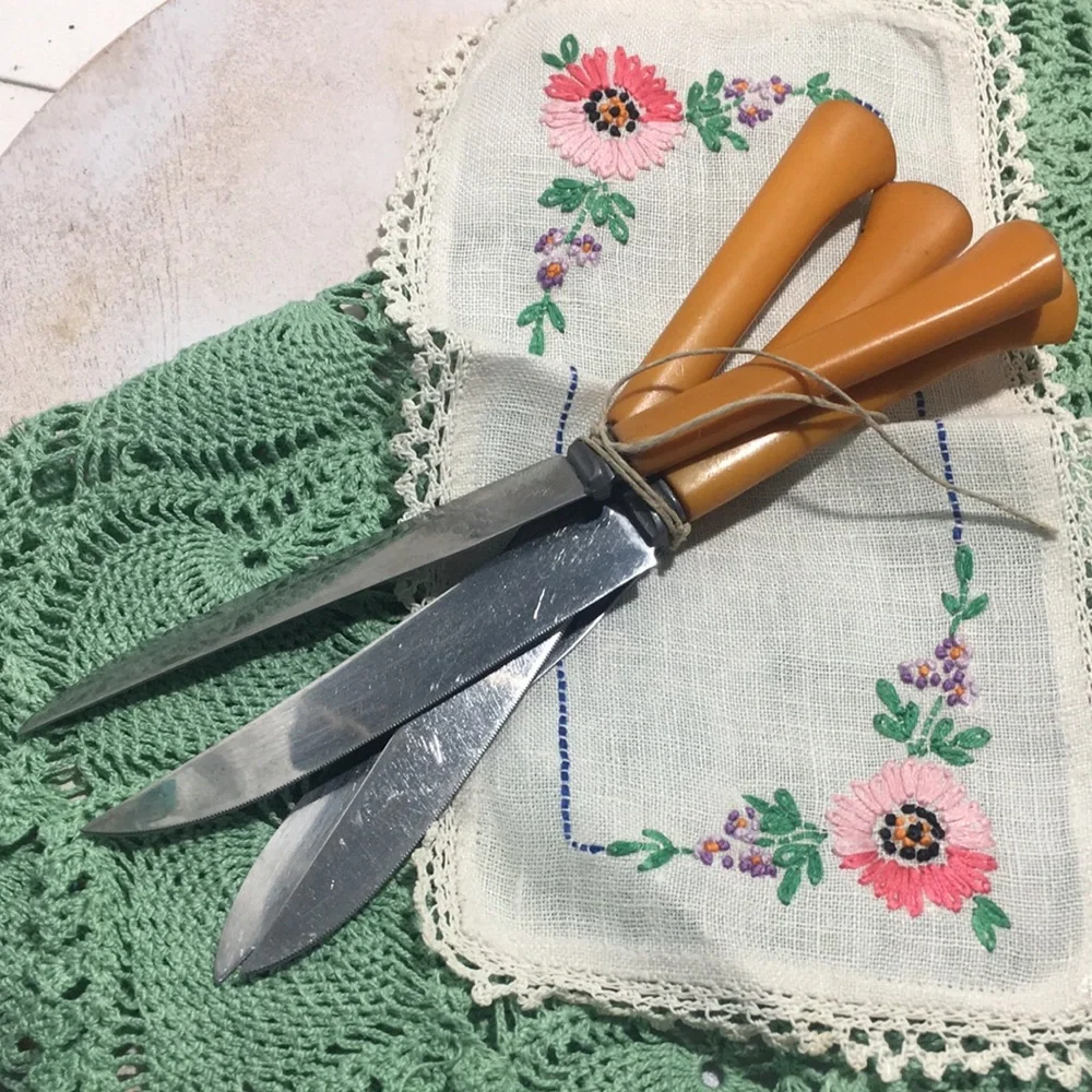 Vintage Bakelite steak knives set of 4 butterscotch